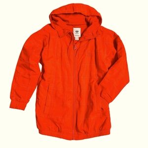 Nike lightweight jacket. Orange with faint checkered pattern. Size XS